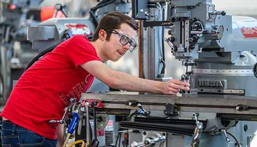 Student working in machine shop